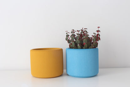 Colorful handmade ribbed planter